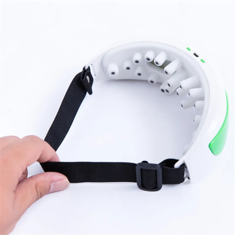 Aparato de masaje ocular eléctrico que alivia migrañas, tensión y ojos secos.